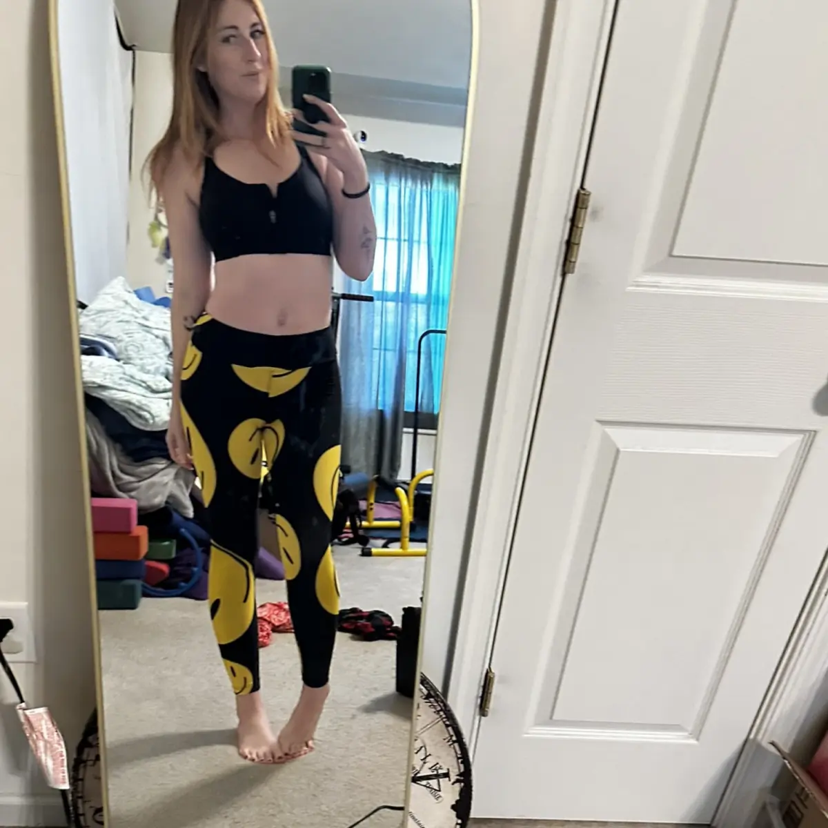 Smiley yoga pants worn
